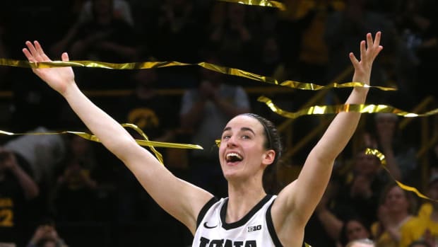 Caitlin Clark celebrates during Iowa’s senior night.